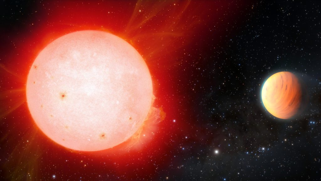 Planet berbulu raksasa yang mengorbit bintang katai merah yang keren