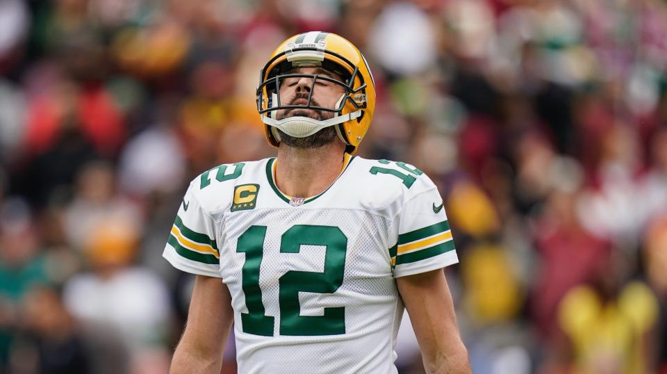 Pelanggaran Aaron Rodgers dan pelanggaran Packers tidak lagi serius.  (Foto AP/Patrick Simansky)