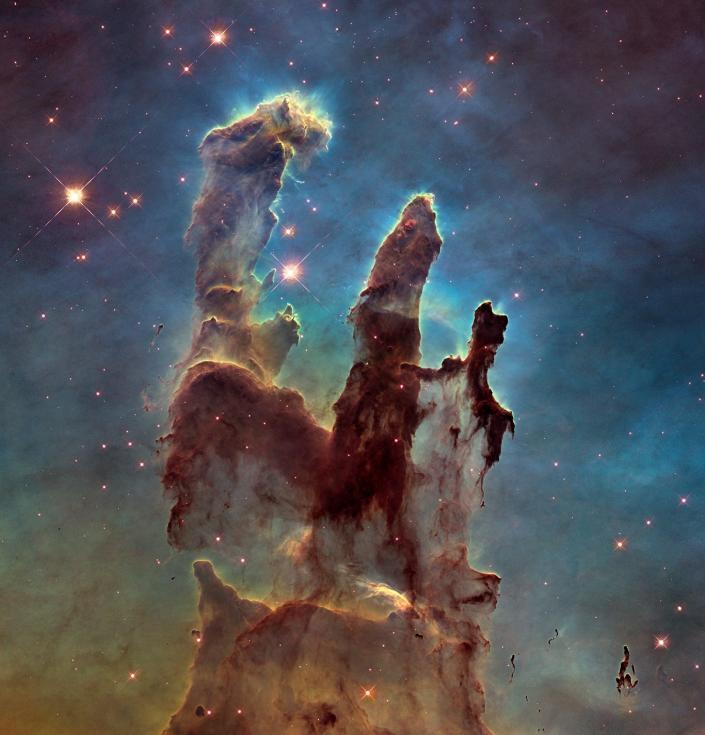 Nebula Elang: Pilar Penciptaan, tabir debu dan gas yang membentuk bintang dengan latar belakang biru-ungu dan hijau kosmik