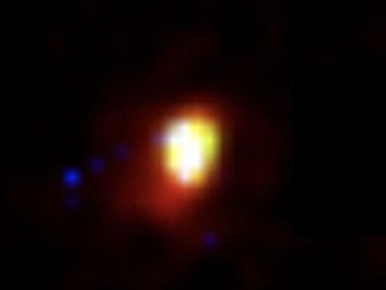 Gambar berwarna CEERS-93316, sebuah galaksi yang diyakini para peneliti muncul hanya 235 juta tahun setelah Big Bang.